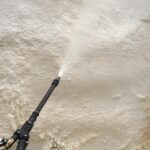 The silicate-modified polyurethane material used for spraying to plug air leaks in coal mines has excellent adhesion, flame retardancy, water resistance, corrosion resistance, and a certain toughness. It can still plug air leaks and seal when deformed along with the rock layer and wall, and also has a certain reinforcement effect.