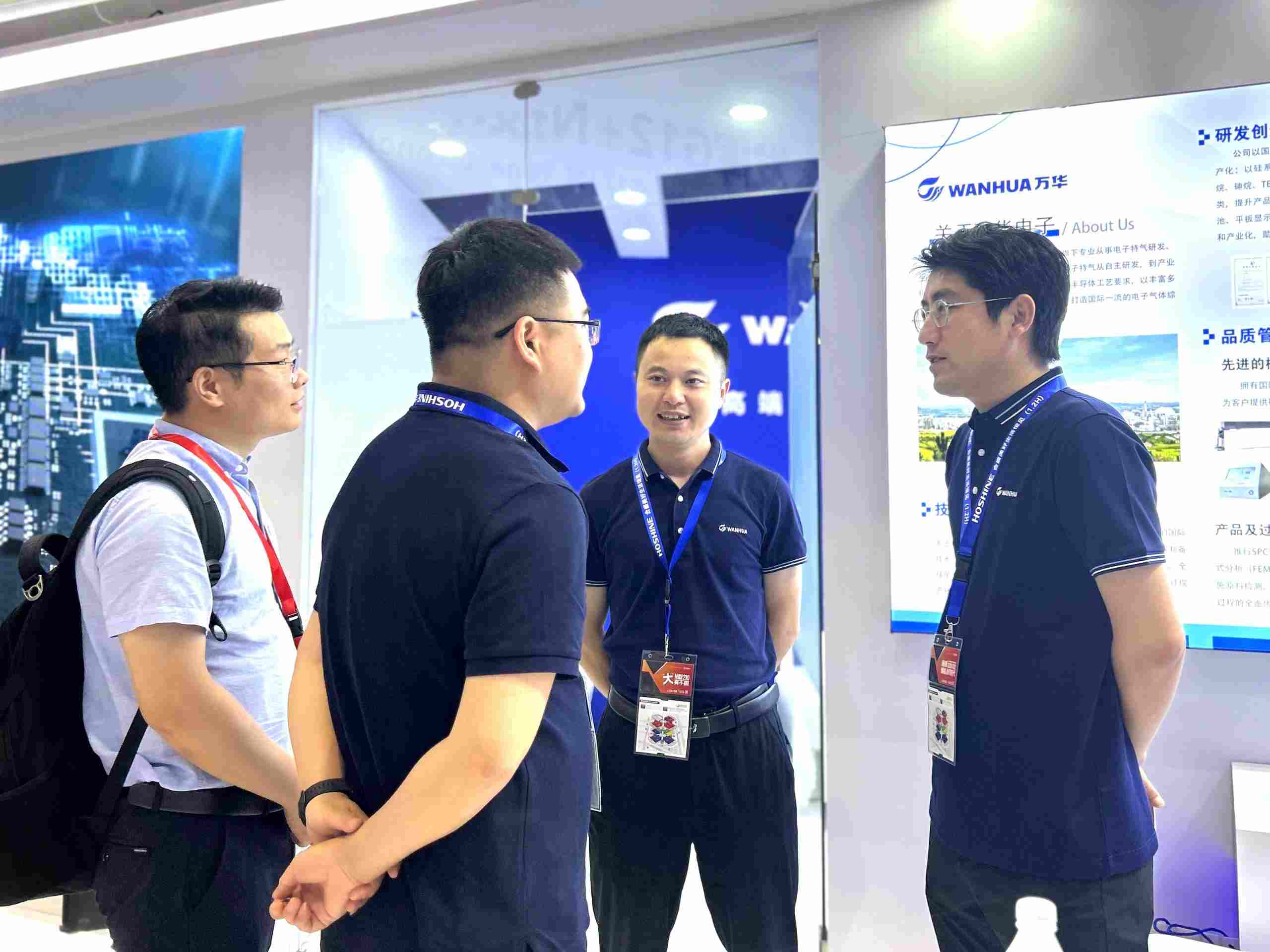 Marketing staff and exhibitors share technology and discuss ideas
